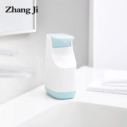 Modern matte white and teal plastic soap pump dispenser with sleek design for kitchen space-saving use