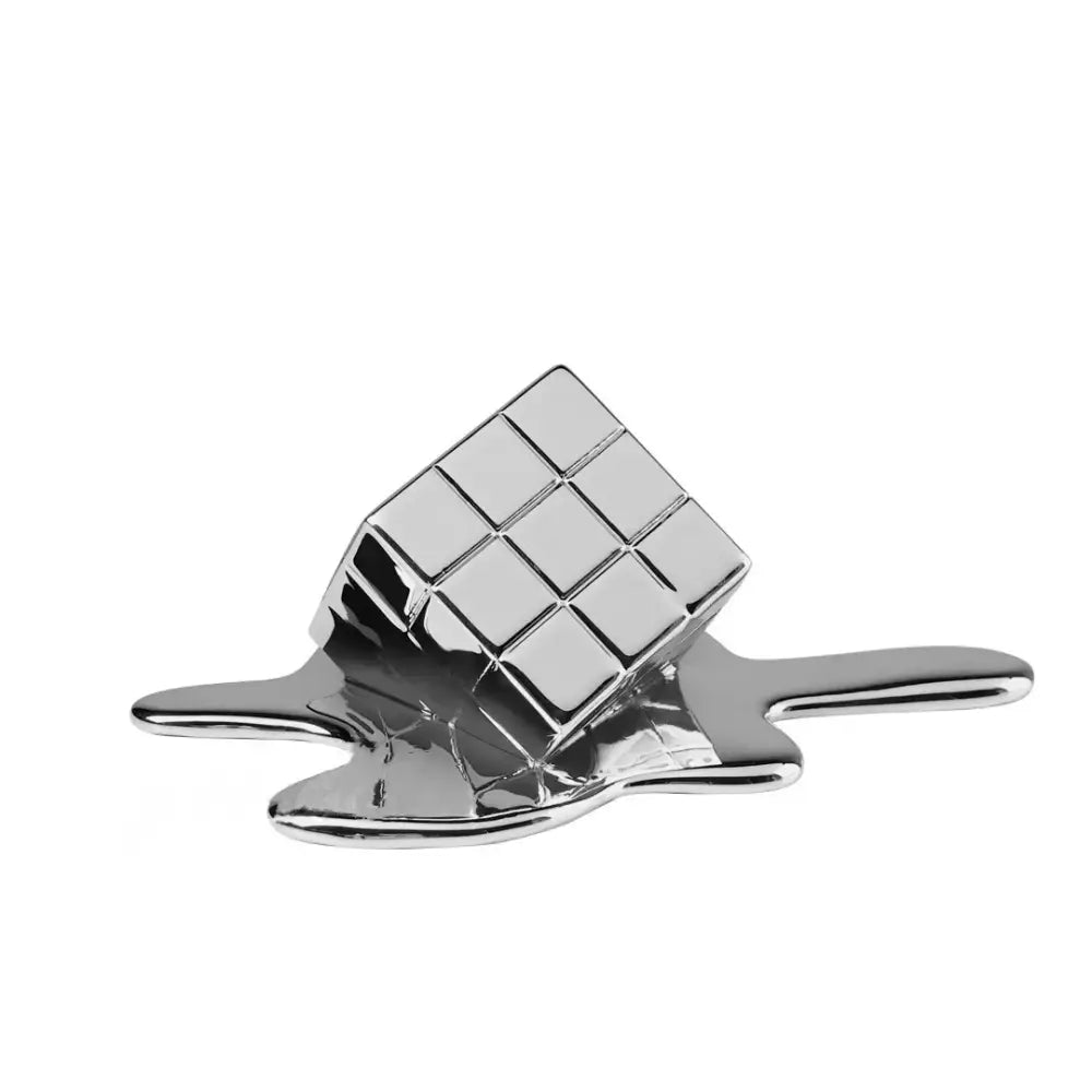 Shiny chrome-plated cube-shaped desk organizer with melting design modern geometric gold resin decorbites sculpture
