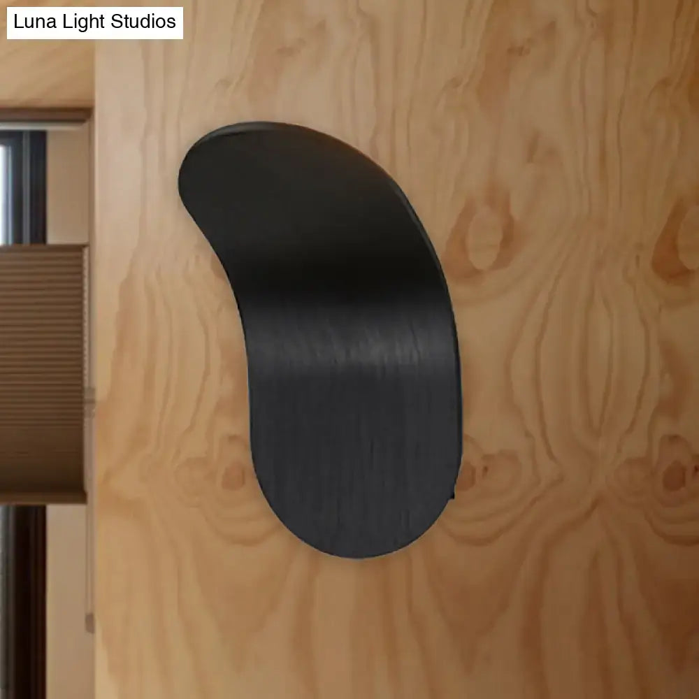 Modern metal bracket wall light with black matte finish and sleek curved design for bedroom in black gold coffee tone
