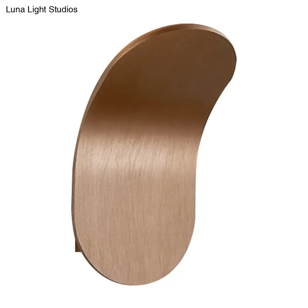 Modern metal bracket wall light with a sleek brushed copper finish and curved design in black gold coffee tones