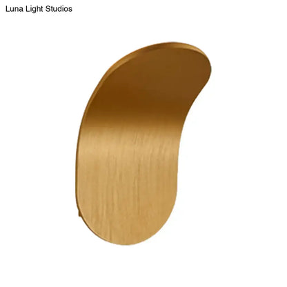 A sleek brushed gold modern metal bracket wall light with smooth curves in black gold coffee finish for bedroom use