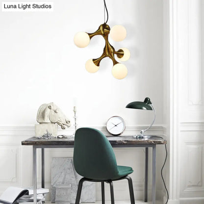 Lámpara de araña moderna de metal con forma de estrella y pantalla de cristal esférica - Disponible en 5/9/15 luces