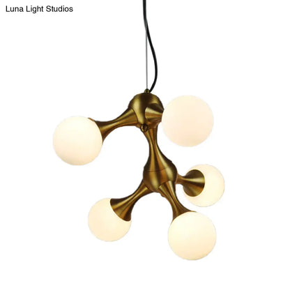Lámpara de araña moderna de metal con forma de estrella y pantalla de cristal esférica - Disponible en 5/9/15 luces