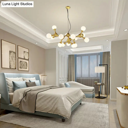 Lámpara de araña moderna de metal con forma de estrella y pantalla de cristal esférica - Disponible en 5/9/15 luces