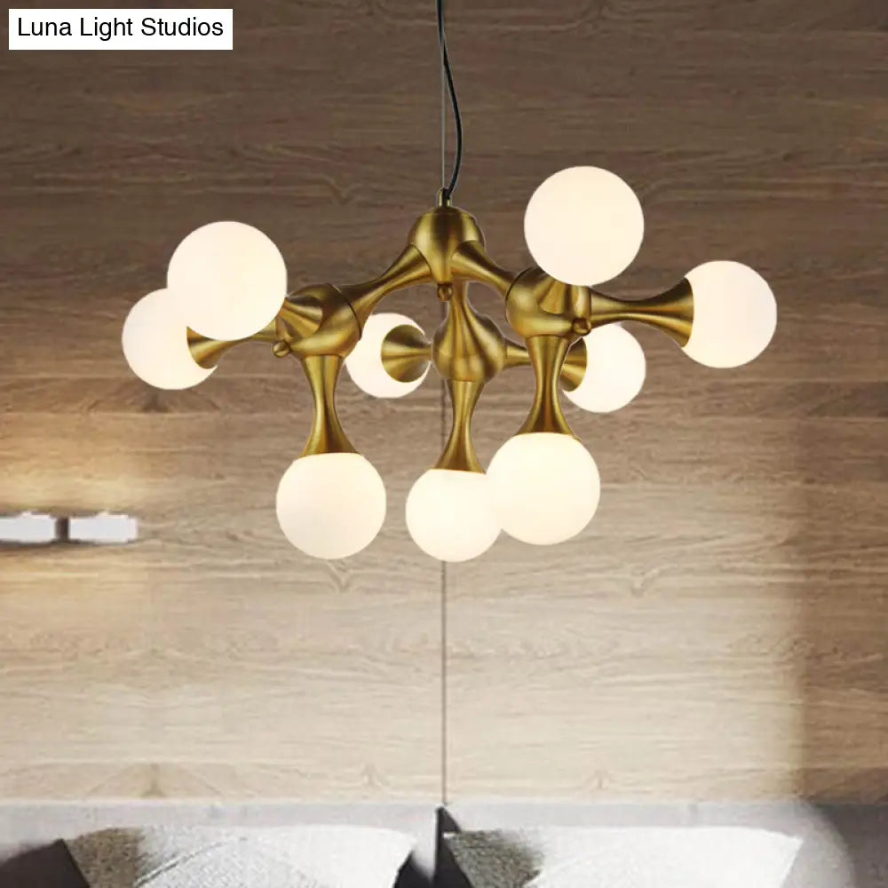 Lámpara de araña moderna de metal con forma de estrella y pantalla de cristal esférica - Disponible en 5/9/15 luces