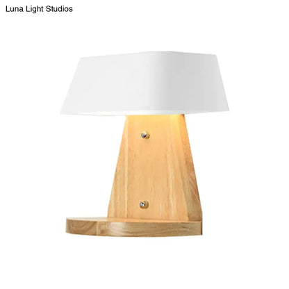 Minimalist wooden table lamp with white fabric shade and brass screws complementing modern metal light fixture wooden backplate
