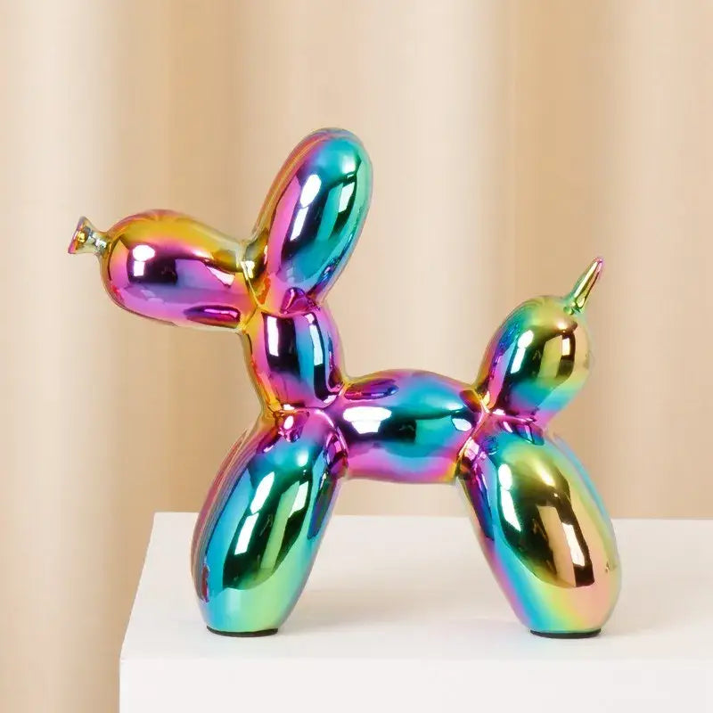 Modern metallic ceramic balloon dog statue with glossy iridescent surface shifting between pink blue green gold hues decorbites ceramic balloon dog decor