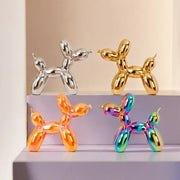 Modern metallic ceramic balloon dog statues in silver gold orange and iridescent finishes for living room decor