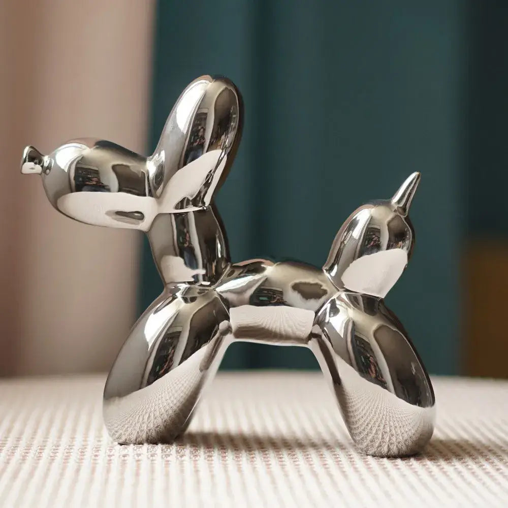 Shiny silver ceramic balloon dog sculpture with sleek reflective metallic finish for modern living room decorbites balloon dog decor