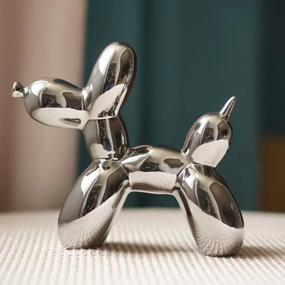 Shiny silver ceramic balloon dog sculpture with sleek reflective metallic finish for modern living room decorbites balloon dog decor