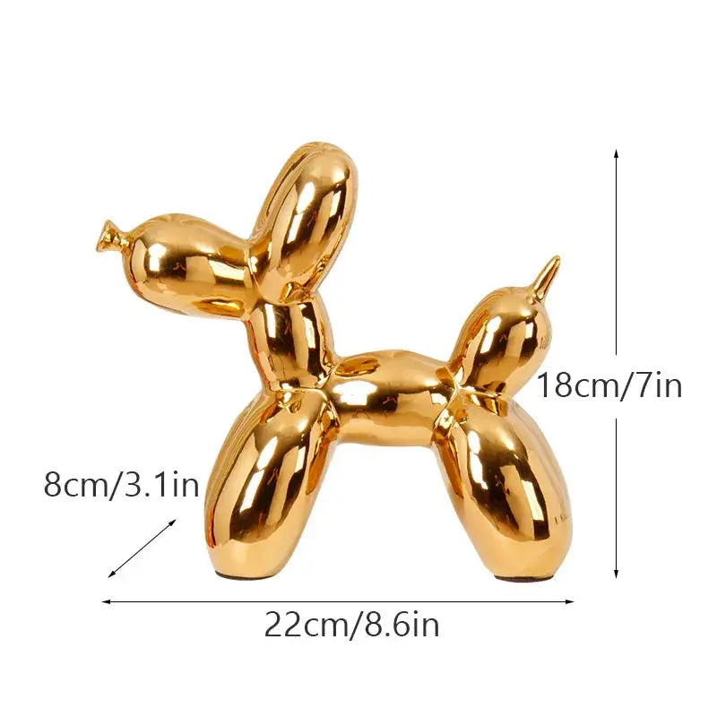 Shiny gold ceramic balloon dog figurine with smooth reflective surface for modern living room decor by decorbites