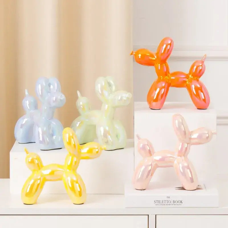 Vibrant modern metallic ceramic balloon dog statues in pastel yellow orange and pink for living room decorbites ceramic balloon dog decor