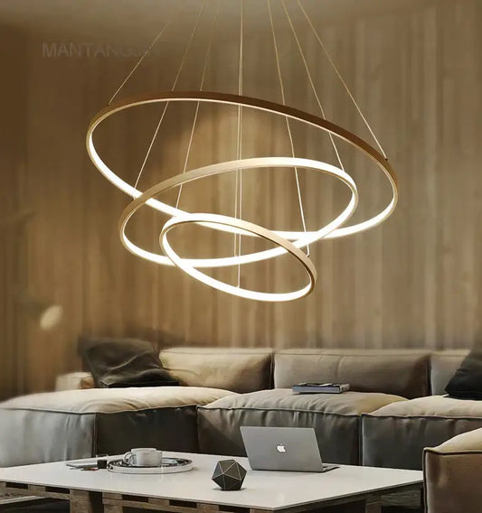 Modern metallic circle rings led pendant lamp with three interlocking metallic rings and warm led illumination for dining room decorbites circle rings pendant lamp