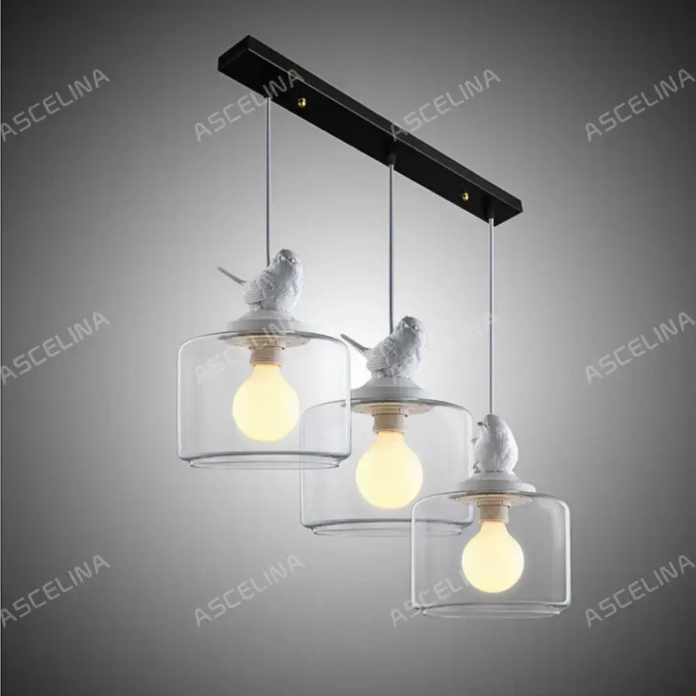 Modern metallic five hook coat rack with decorbites ceiling plate featuring three clear glass pendant lights with ceramic birds
