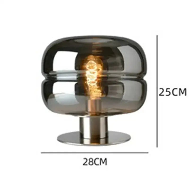 A sleek modern bedroom table lamp with a dark smoked glass dome and polished chrome base for elegant lighting