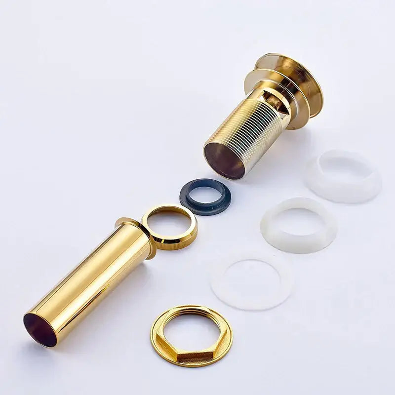 Gold-colored brass modern metallic pop up bathroom basin waste with threaded body and matching hexagonal nut for bathroom basin