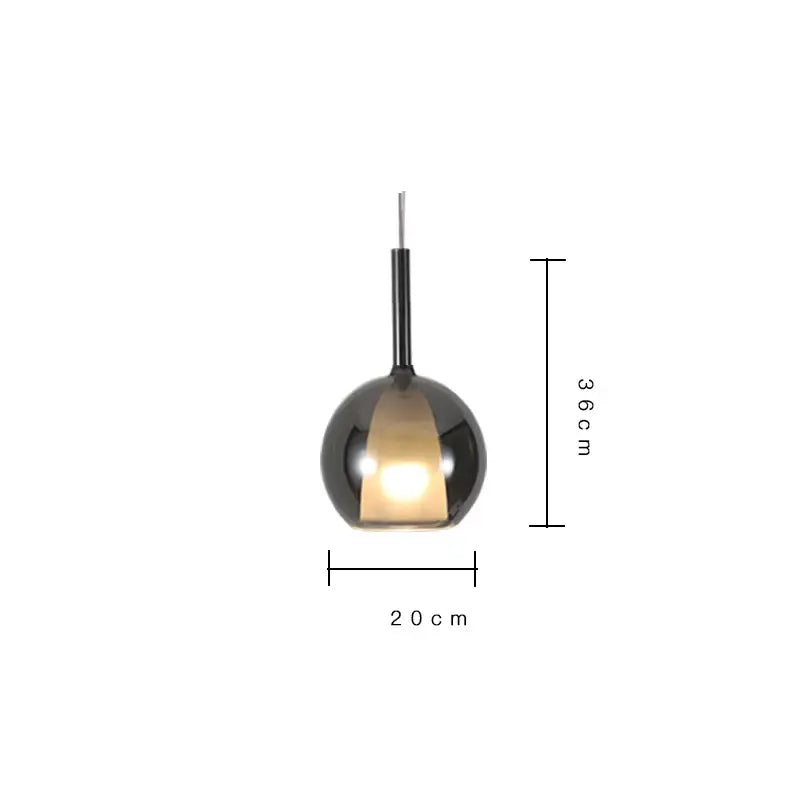 A sleek black spherical pendant light with warm glow in decorbites designer glass chandelier for dining room decor