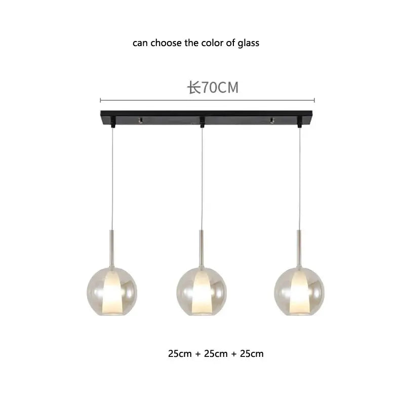 Modern minimalist pendant light with three spherical glass globes on a black bar decorbites designer glass chandelier