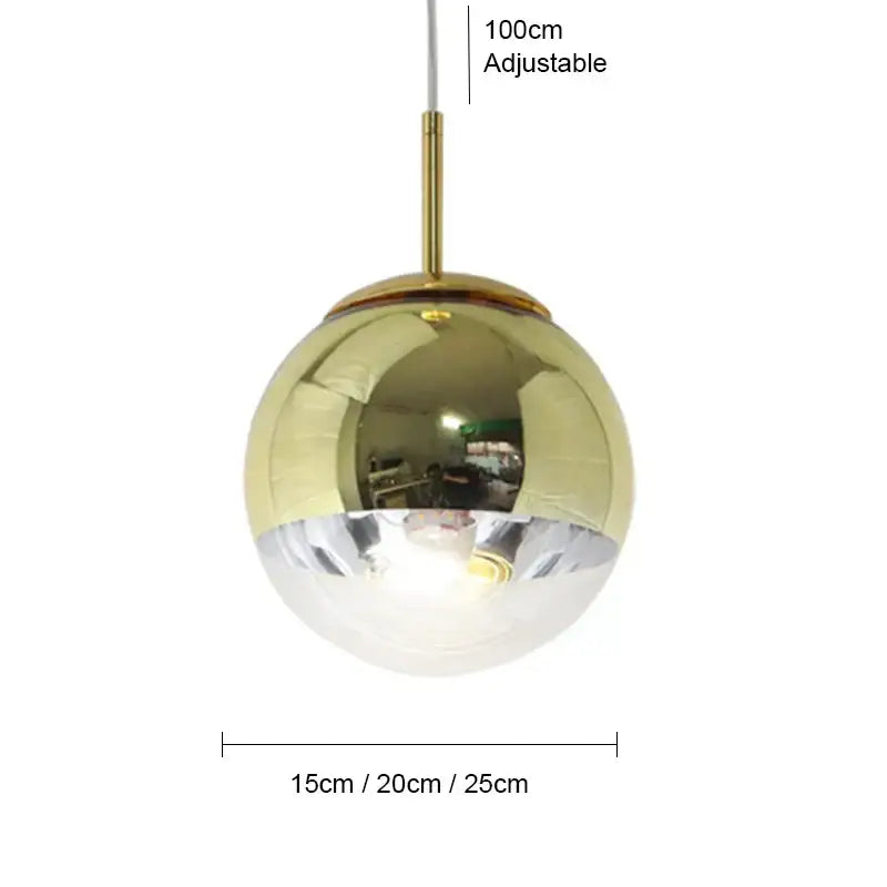 Modern ball pendant light with polished gold and clear glass halves suspended by adjustable brass rod for living room
