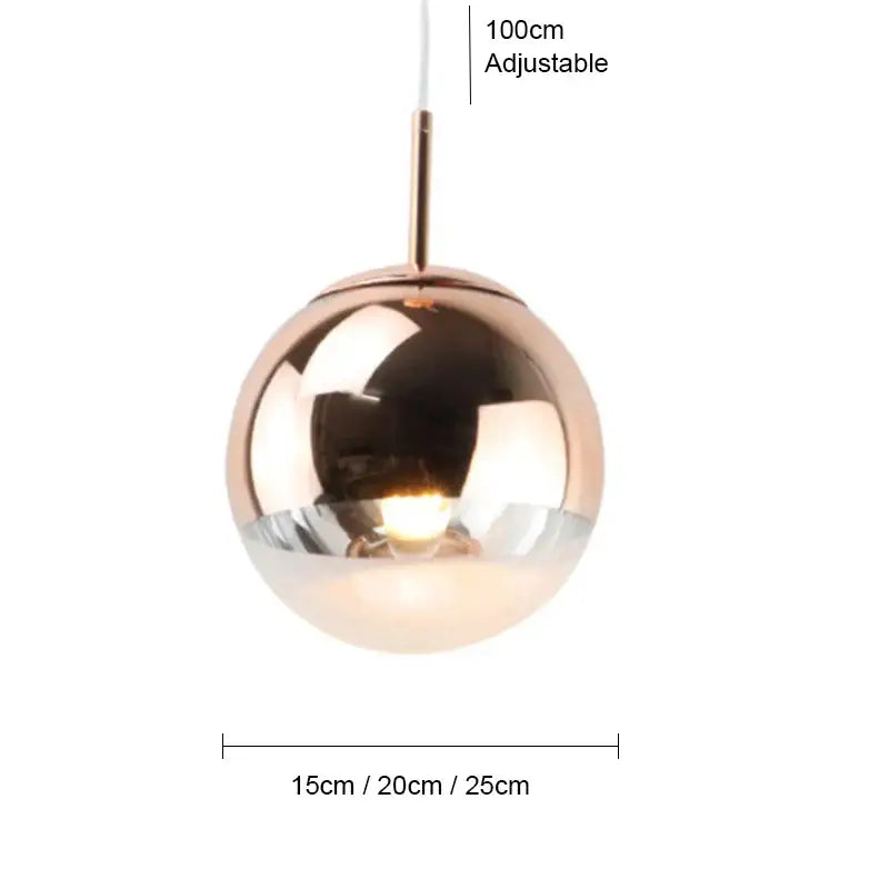 A sleek rose gold metallic ball pendant light with mirrored finish and frosted glass base for living room