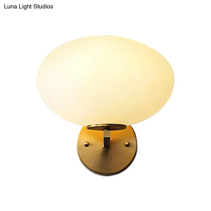 DecorBites™ DecorBites™ Modern Milk Glass Wall Sconce with Brass Finish