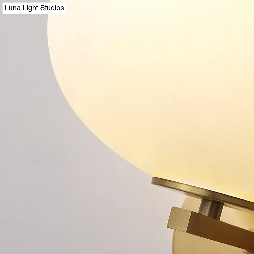 DecorBites™ DecorBites™ Modern Milk Glass Wall Sconce with Brass Finish