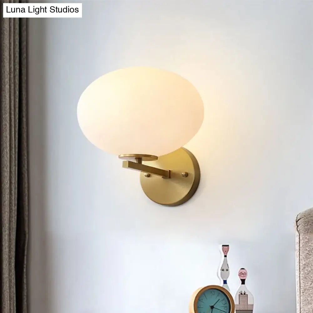 DecorBites™ DecorBites™ Modern Milk Glass Wall Sconce with Brass Finish