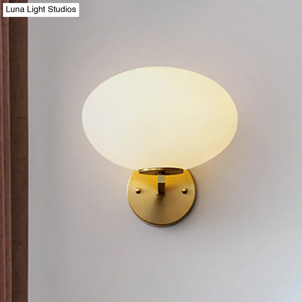 DecorBites™ DecorBites™ Modern Milk Glass Wall Sconce with Brass Finish
