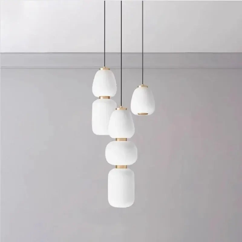 Modern milky white glass ball pendant light with frosted glass and gold-toned accents for dining room decorbites glass ball pendant