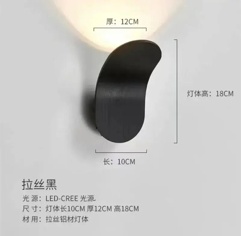 Black brushed aluminum wall light with sleek curved design modern minimalist decorbites adjustable cob led bedroom sconce