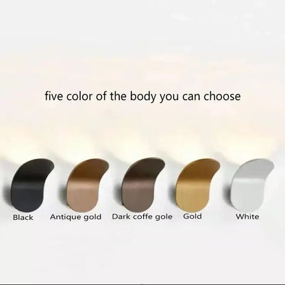 A sleek wall light in five finishes featuring decorbites adjustable cob led for modern minimalist bedroom sconce decor