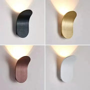 Modern minimalist adjustable cob led wall light with a sleek curved metallic body in black gold rose gold and white finishes