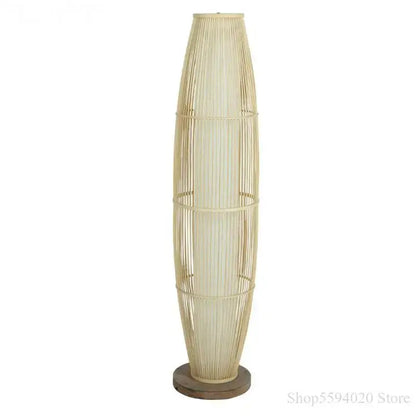 Tall slender floor lamp with natural beige woven rattan shade and dark wood base for warm living room decorbites bamboo floor lamp