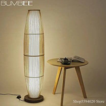 Modern minimalist bamboo floor lamp with warm diffused light and sleek cylindrical design for living room decorbites bamboo floor