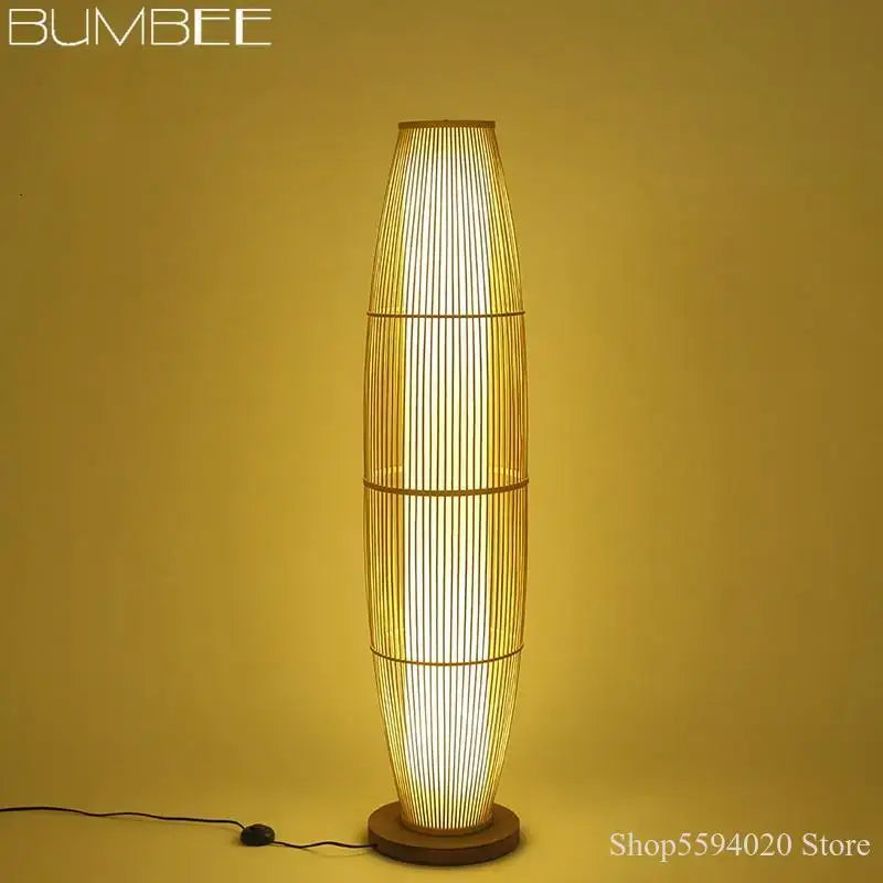Bumbee bamboo floor lamp with tall slender design and warm golden light for modern minimalist living room decorbites floor lamp