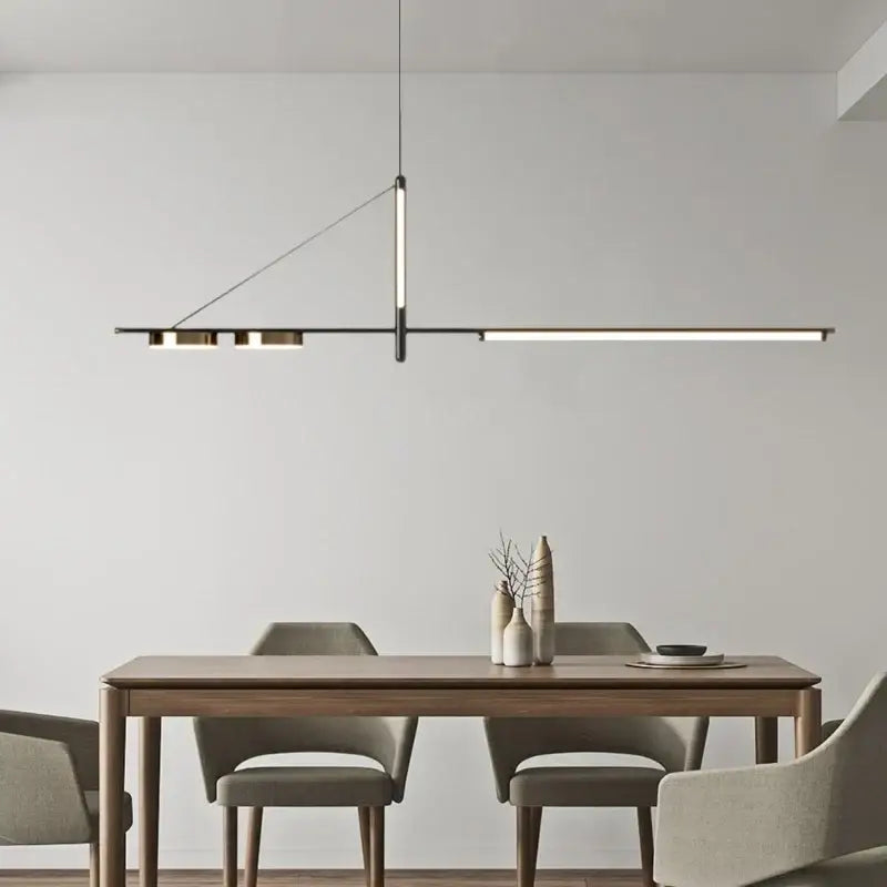 Modern minimalist black chandelier pendant light with sleek gold linear design perfect for dining room decorbites pendant lights