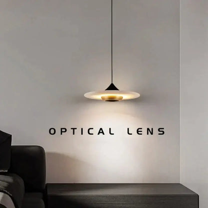Modern minimalist black cloud stone pendant lamp with a sleek conical base and warm translucent shade by decorbites