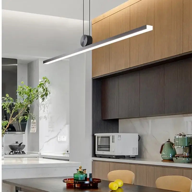 Modern minimalist black dimmable led ceiling chandelier with sleek cylindrical fixture and slim white led bar for dining room decorbites dimmable led