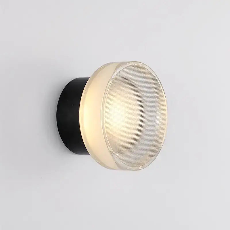 Modern minimalist black wall sconce with decorbites elegant glass led diffuser for warm bedroom lighting decor