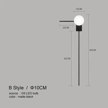 Modern minimalist matte black glass ball wall lights with spherical white bulb for bedroom use