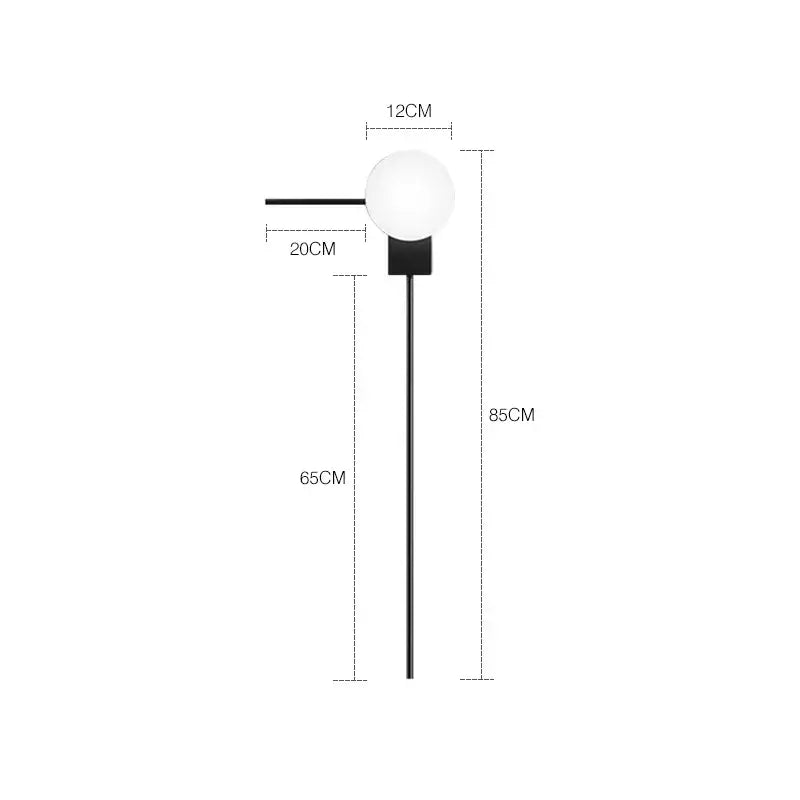 Modern minimalist black metal wall lights with a white glass ball globe for bedroom lighting