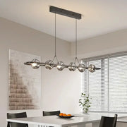 Modern minimalist black glass led chandelier pendant light with five spherical bulbs for bedroom lighting