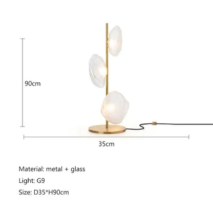 Modern minimalist floor lamp with slender gold metal frame and three translucent cloud-shaped glass shade led fixtures