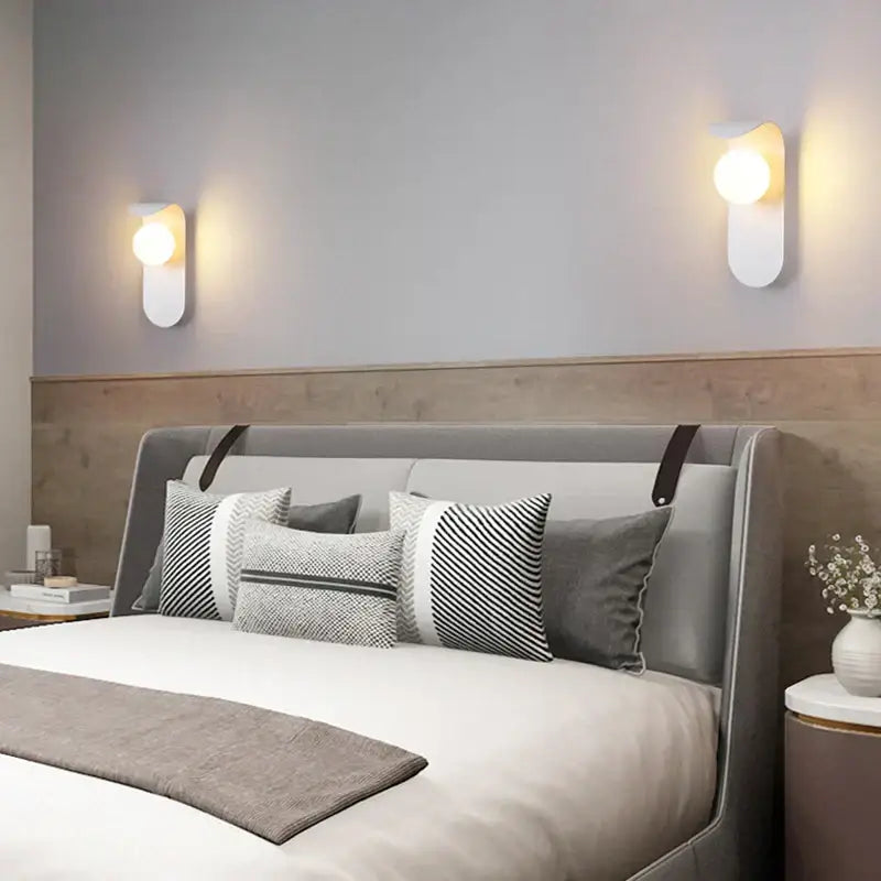 Modern minimalist black and gold frosted glass led wall lamp with sleek white wall sconces for bedroom lighting