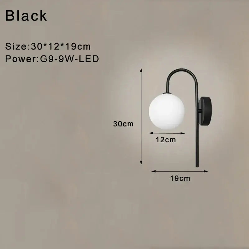 Modern minimalist black led wall lamp with curved metal arm and frosted glass globe shade for bedroom use