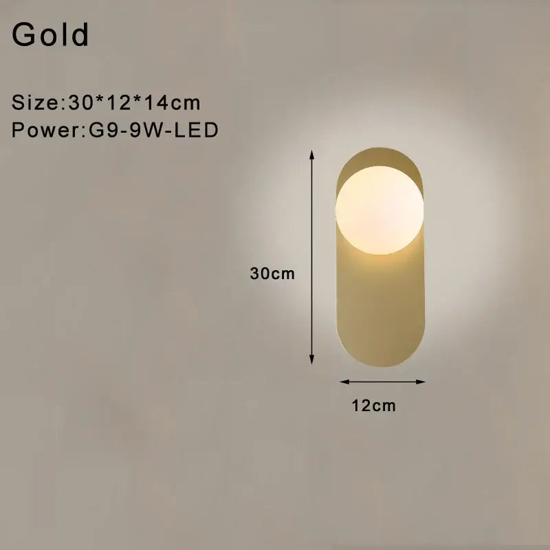 Modern minimalist gold cylindrical led wall lamp with frosted glass and warm glow for bedroom lighting