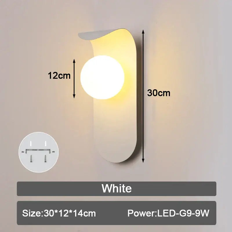 White modern led wall lamp with sleek curved design and warm circular light featuring frosted glass for bedroom use