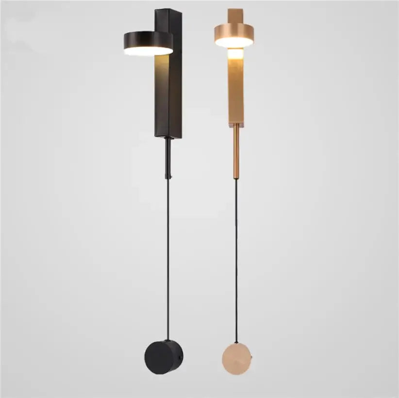 Modern minimalist black and gold t style wall light sconce with matte black and brushed gold finishes for bedroom