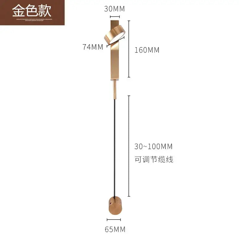 Gold-colored modern minimalist wall light sconce with cylindrical fixture and adjustable black cord for bedroom use