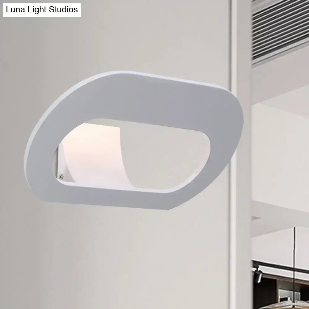 Modern minimalist wall lamp with black and grey oval shade featuring white wall-mounted sconce and soft diffused lighting